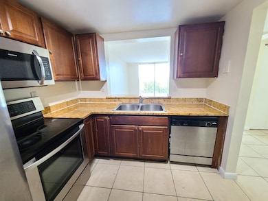 496 NW 165th Street Rd unit D409, Miami, FL 33169 - photo 3