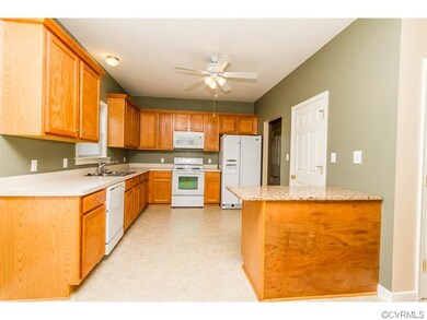 Alternate View of Kitchen with Breakfast Bar