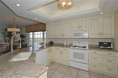 Wonderful kitchen with upgraded granite, custom ca