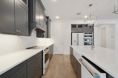 Kitchen with ceramic tile backsplash