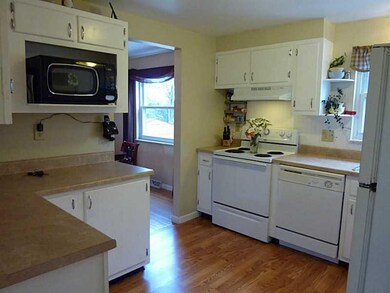 Kitchen. There is a microwave over the counter and