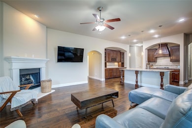 Open Floor Plan! Living Room With A Cozy Fireplace.