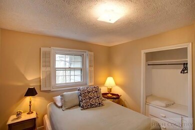 second bedroom, closet with built in drawers