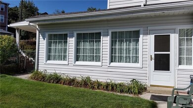 This view from the fenced side yard shows this row