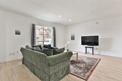 This living room features a spacious, bright, open