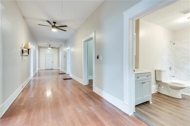 Hall with light wood-style floors