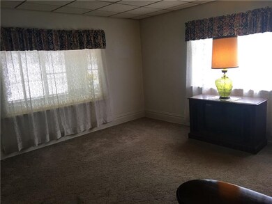 Living Room - two large picture windows and firepl