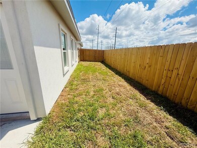 View of fenced backyard