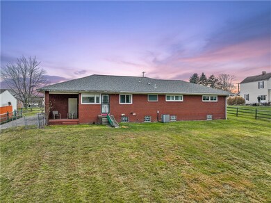 Rear of Home with covered patio area