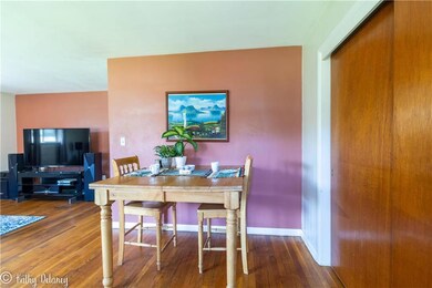 Dining area has double closet.