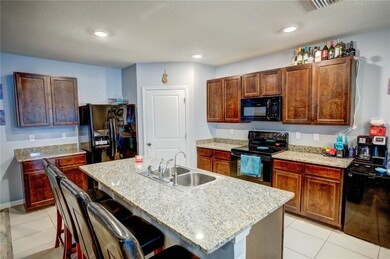 breakfast bar/island & large walk-in pantry