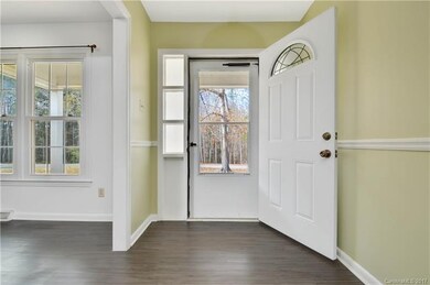 Front entry is separated from the living room.  St