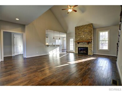 Leading in from the foyer is the spacious living r