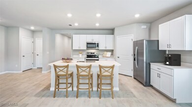 Kitchen featuring appliances with stainless steel