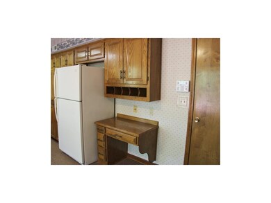 Country kitchen is full of possibilities. Refriger