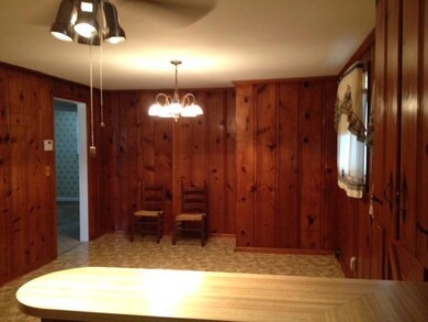 Large dining area with ceiling fan