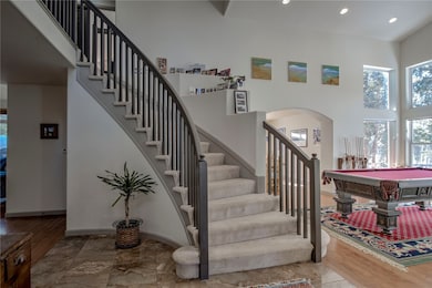 Stairway to the 4 upper level bedrooms