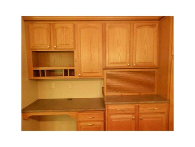 . Built in desk with lots of storage in the kitche