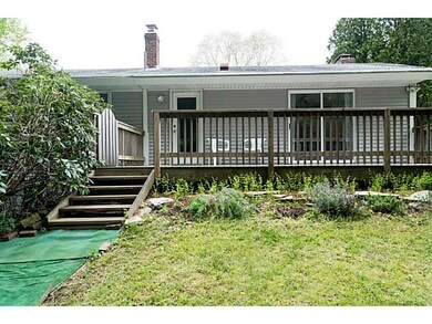 Exterior Back. Sliders From The Dining Room Lead O