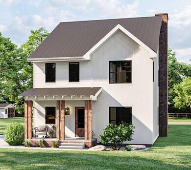 Modern farmhouse with a porch, a chimney, and a front yard