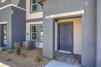 Property entrance with central air condition unit
