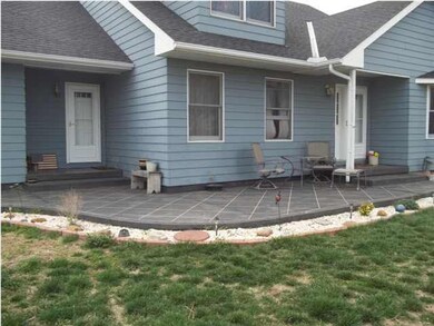 Front patio with decorative concrete