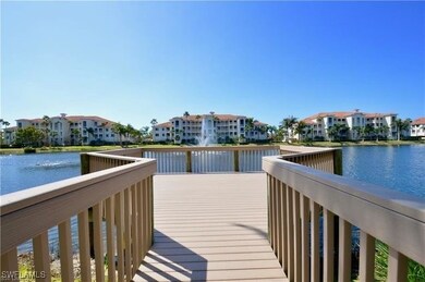 Dock area with a residential view and a water view