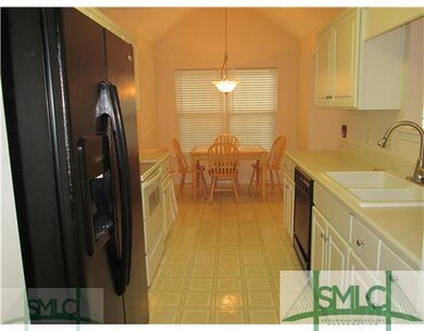 Kitchen. Galley style kitchen, refrigerator,stove,
