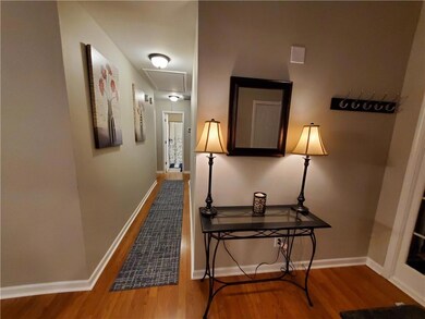 Hall featuring hardwood / wood-style flooring