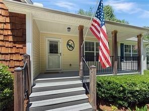 Property entrance with a porch