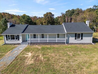 Ranch-style home with a front lawn