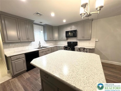Kitchen ~ Updated ~ Granite counters ~ Center Isla