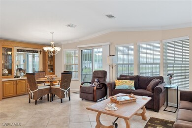 Living room featuring light tile patterned floorin
