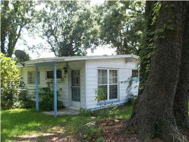 VIEW OF ENTRY ON LEFT SIDE OF THE HOME