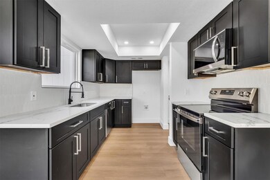 Kitchen featuring stainless steel appliances, a s