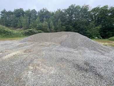 Many piles of prepared material remain