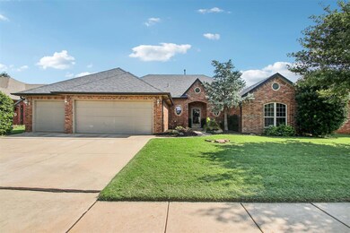 View of front of home featuring a garage and a fro