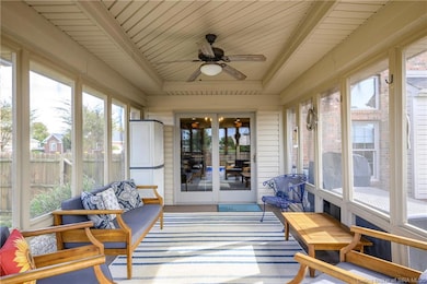 Enclosed, screened-in deck with ceiling fan!