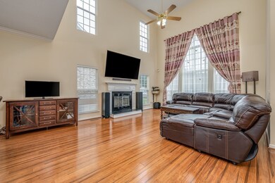 Spacious living and casual dining rooms have tons of natural light, fireplace and ceiling fan! 5255 Catspaw Dr., Antioch, TN 37013