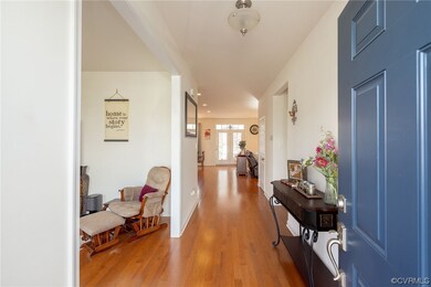 Entryway with light hardwood / wood-style flooring