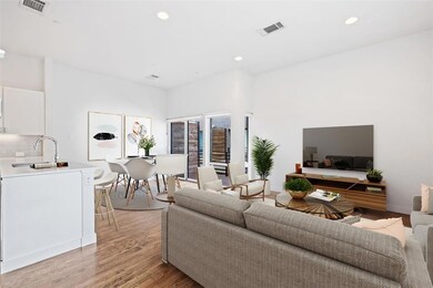 Open concept living room, dining room, and kitchen