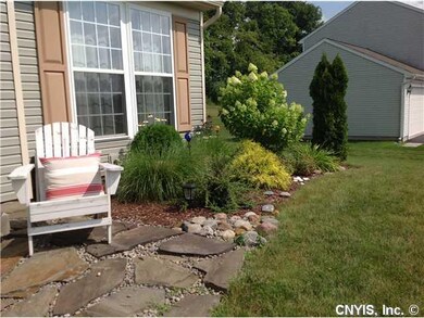 Exterior Front All new landscaping so you can rela