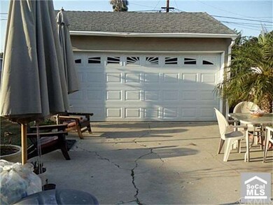2 car garage located in backyard. Tons of parking.