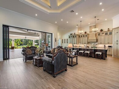 Living room with light hardwood / wood-style floor