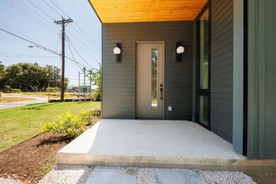 Property entrance featuring a lawn