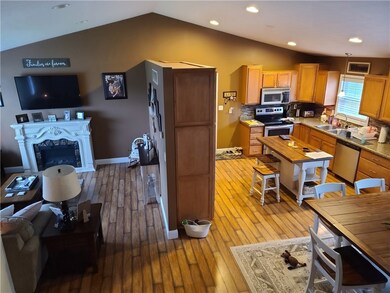 LIVING ROOM, DINING ROOM AND KITCHEN COMBINATION.