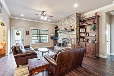 Large Fireplace with ductwork and thermostate.