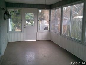 GLASS ENCLOSED PORCH