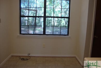 Breakfast area overlooking backyard.  Freshly pain