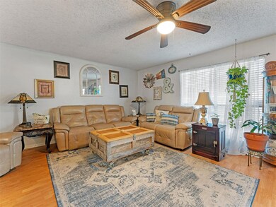 Living room featuring light hardwood / wood-style 